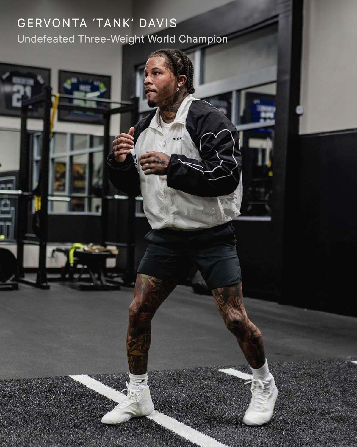 Gervonta Tank Davis wearing the Boxraw Tunero Track Jacket in a boxing lifestyle setting