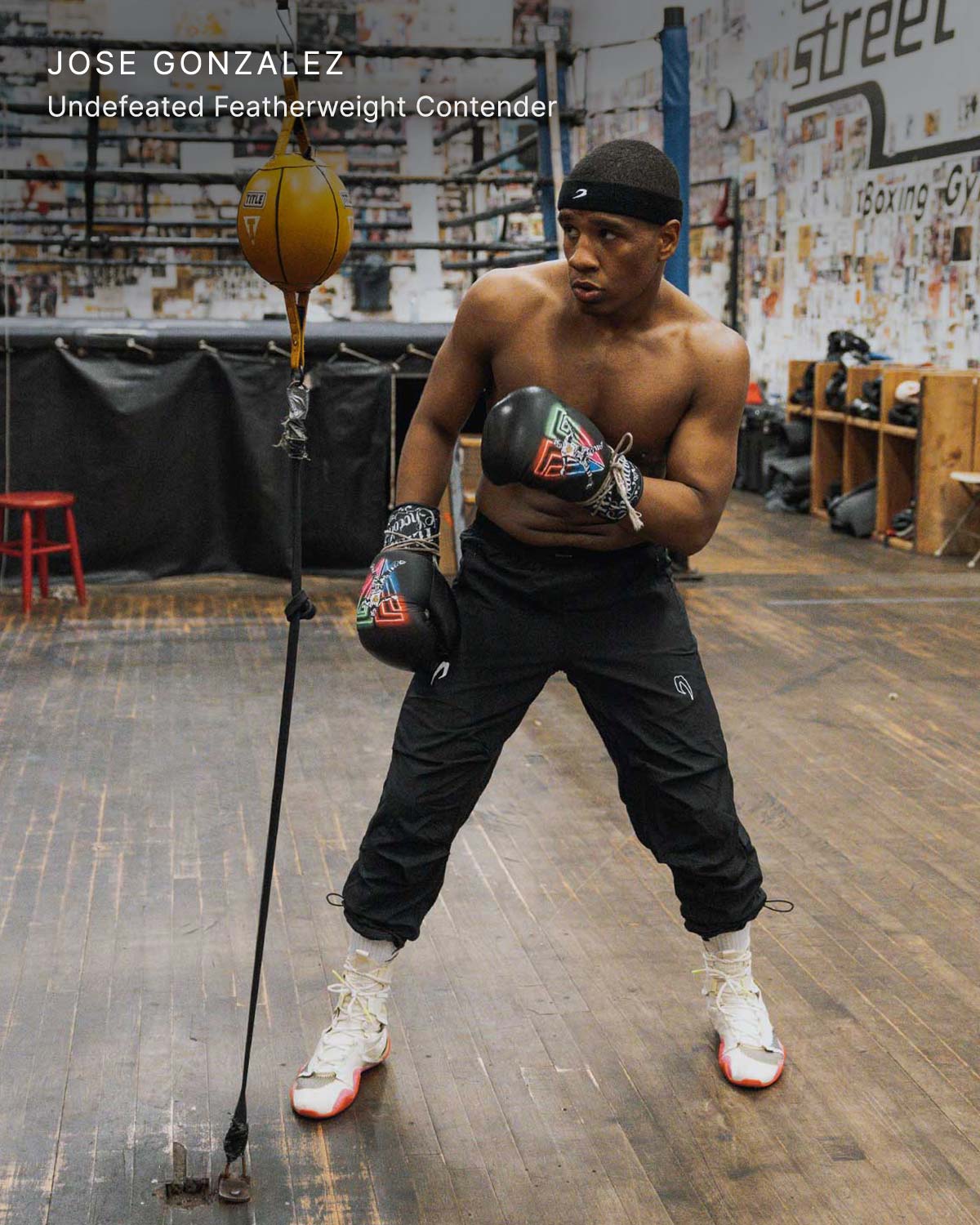 Jose Gonzalez wearing Boxraw Tunero Track Bottoms Black in a boxing lifestyle training setting