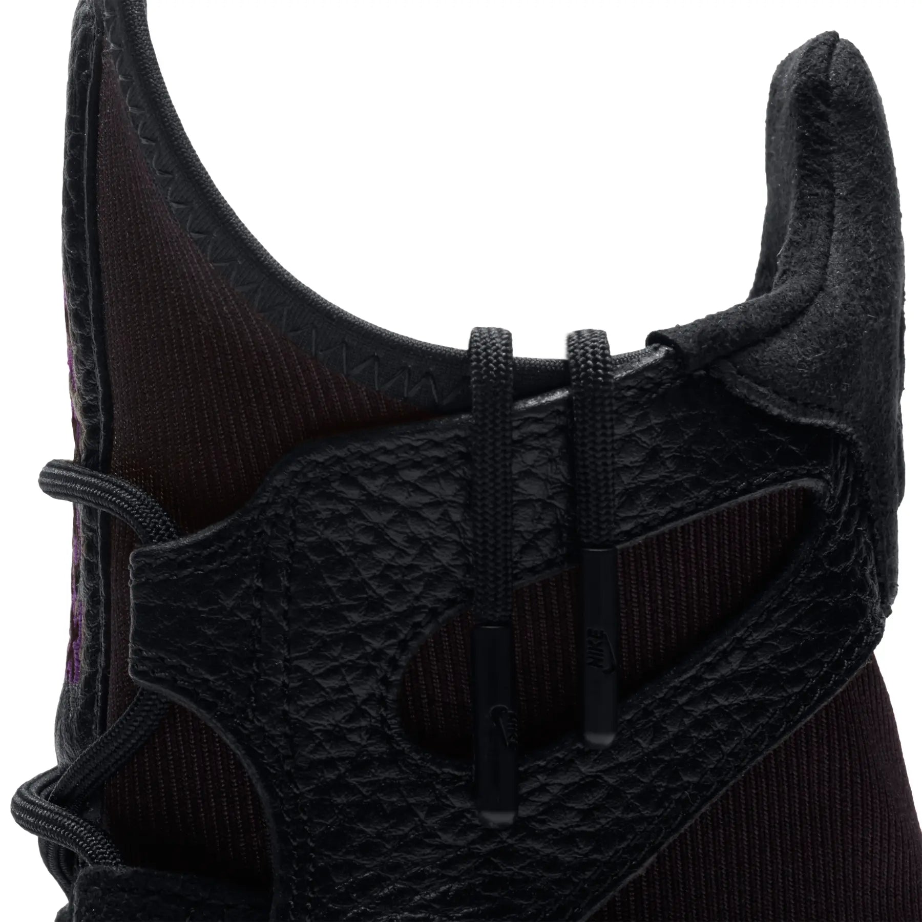 Close-up of Nike Air Max Box Black showing synthetic textile material and performance mesh
