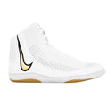 Athlete competing on mat wearing Nike Inflict 4 Wrestling Boots showcasing superior traction.