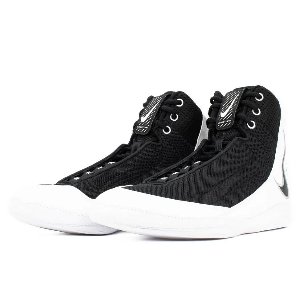 Lateral side view of Nike Inflict 4 wrestling shoes showing mesh uppe