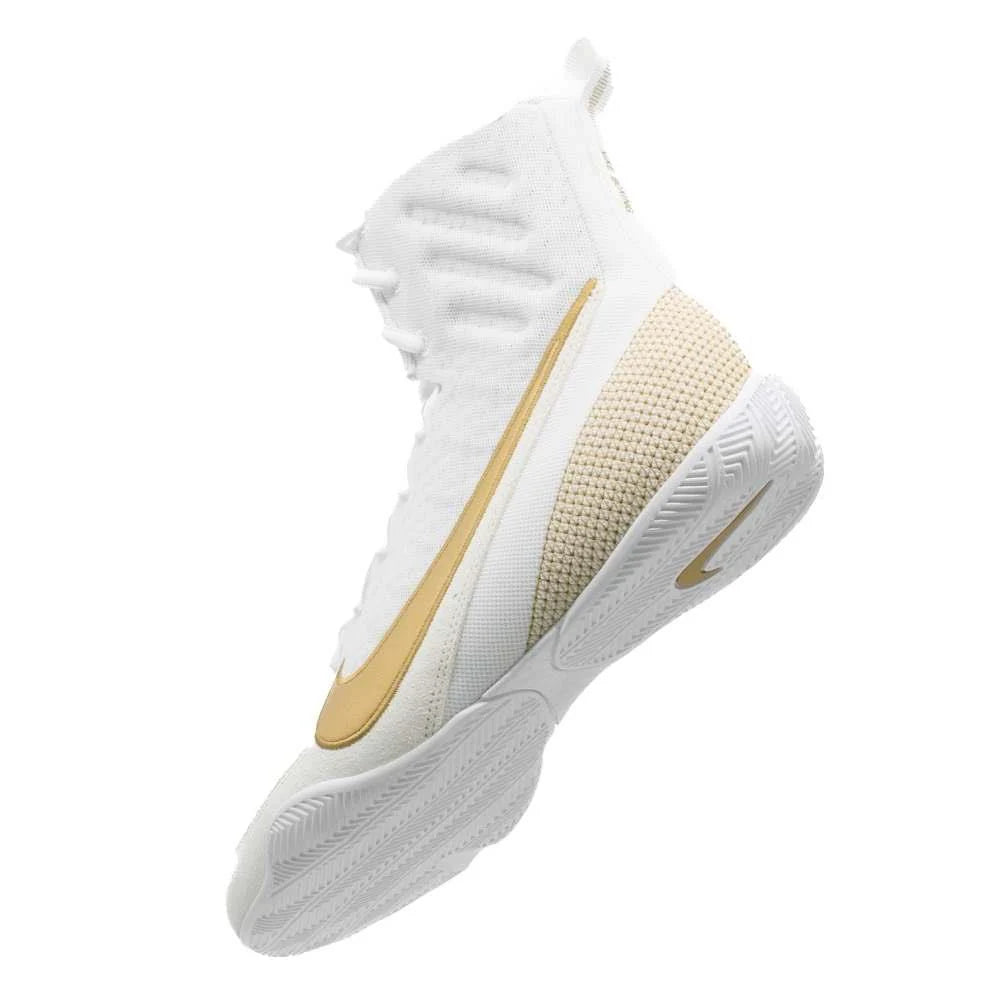 Close-up of Nike Machomai 3 boxing shoe laces highlighting upgraded eyelet design for secure fit.
