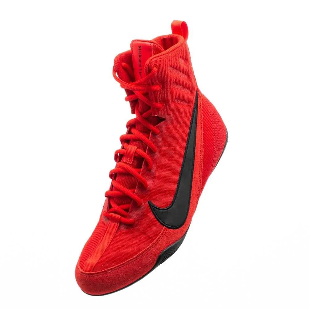 Boxer wearing Nike Machomai 3 Red Black boxing shoes during ring training session.