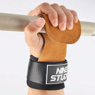 No-hole gym grips used during pull-up training