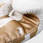 Handmade in Thailand professional boxing gloves with attached thumb for injury prevention.