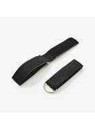 Person performing home workout using resistance bands with handles