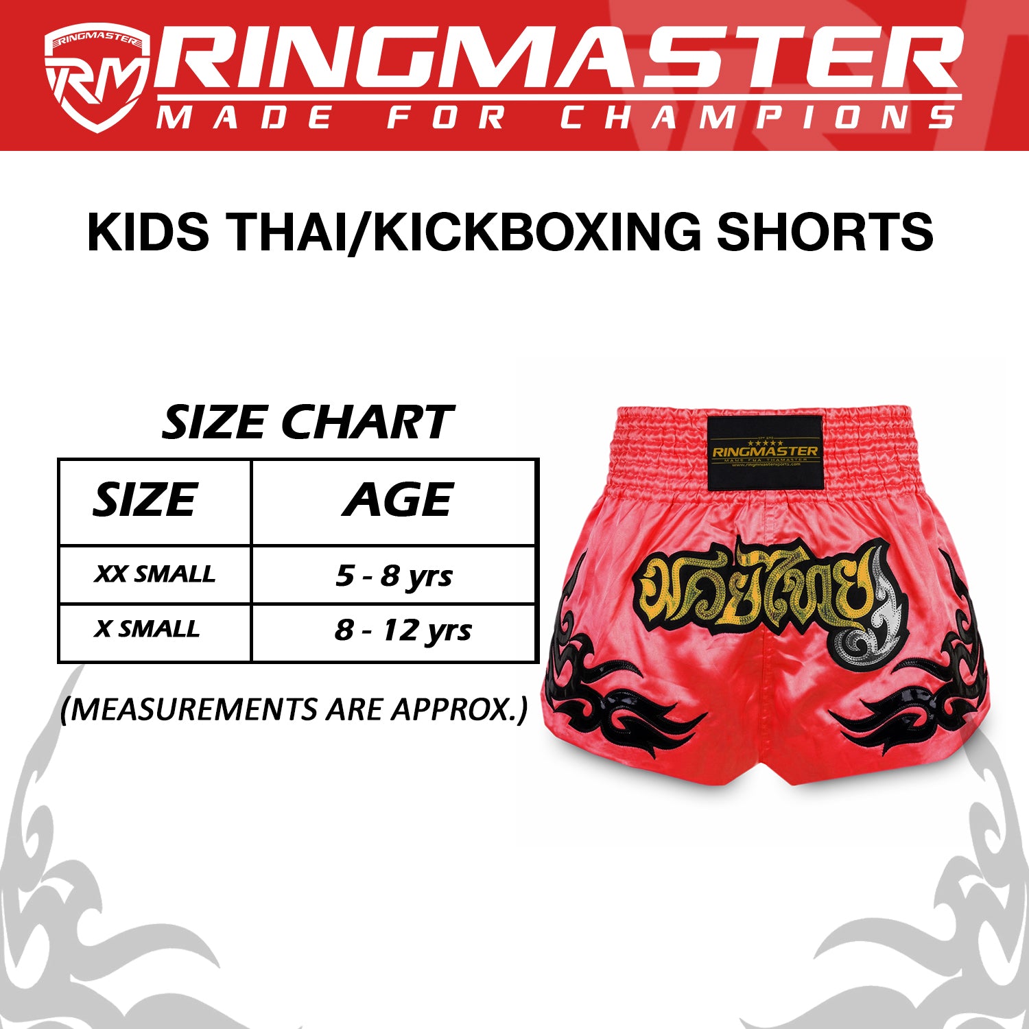 Side view of kids Glory Red Muay Thai shorts with tribal flame design and high side slit