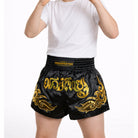 Kids Onyx Black Muay Thai shorts worn during Muay Thai training session