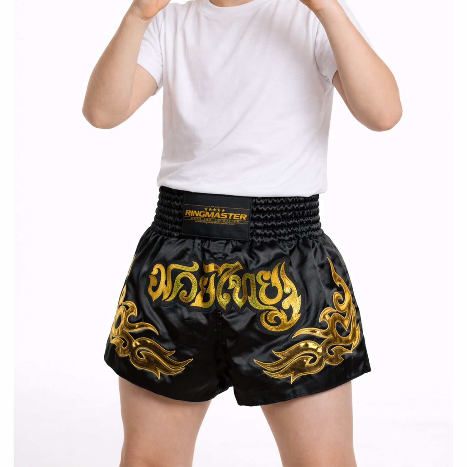 Kids Onyx Black Muay Thai shorts worn during Muay Thai training session