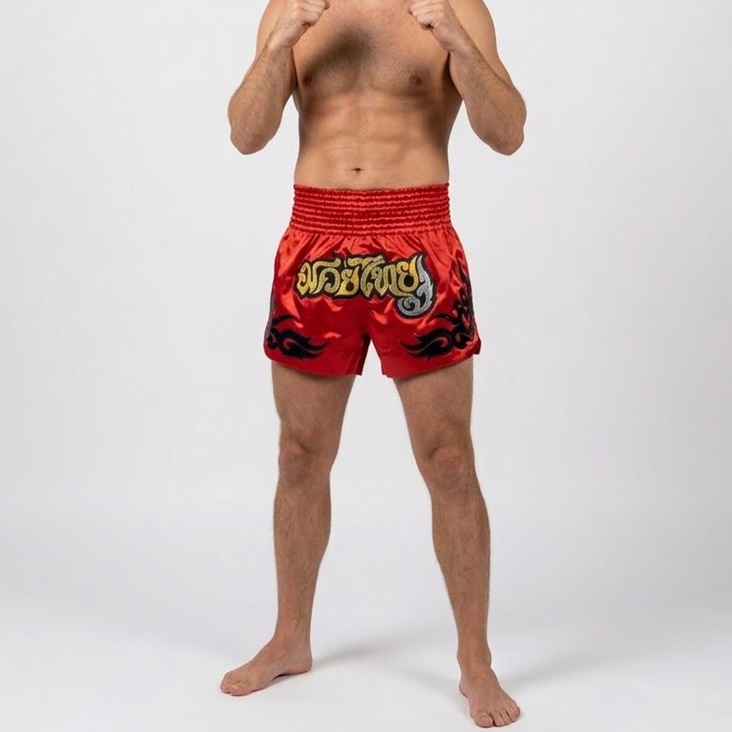 Ringmaster Glory Red Muay Thai shorts worn during Muay Thai training session