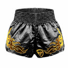Back view of Onyx Black Muay Thai shorts showing Muay Thai script applique