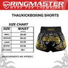 Side view of Onyx Black Muay Thai shorts with tribal flame design and high side slit