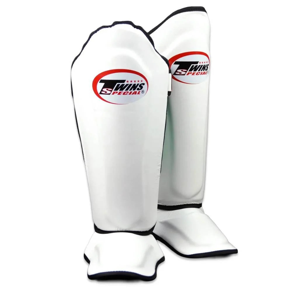 White Twins Double Padded Leather Shin Guards shown as a pair from the front with shin and instep sections visible