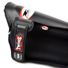 Twins SGL10 Black shin guards with elasticated foot straps and cotton lining for secure stability.