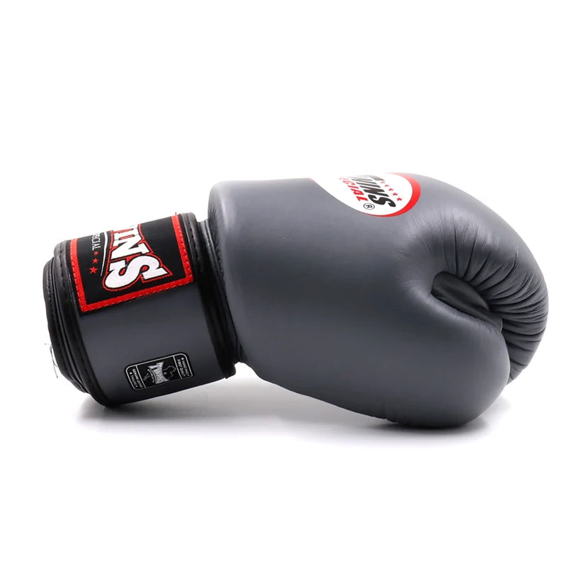 Side view of Twins Special BGVL3 Boxing Gloves Grey showing training glove shape