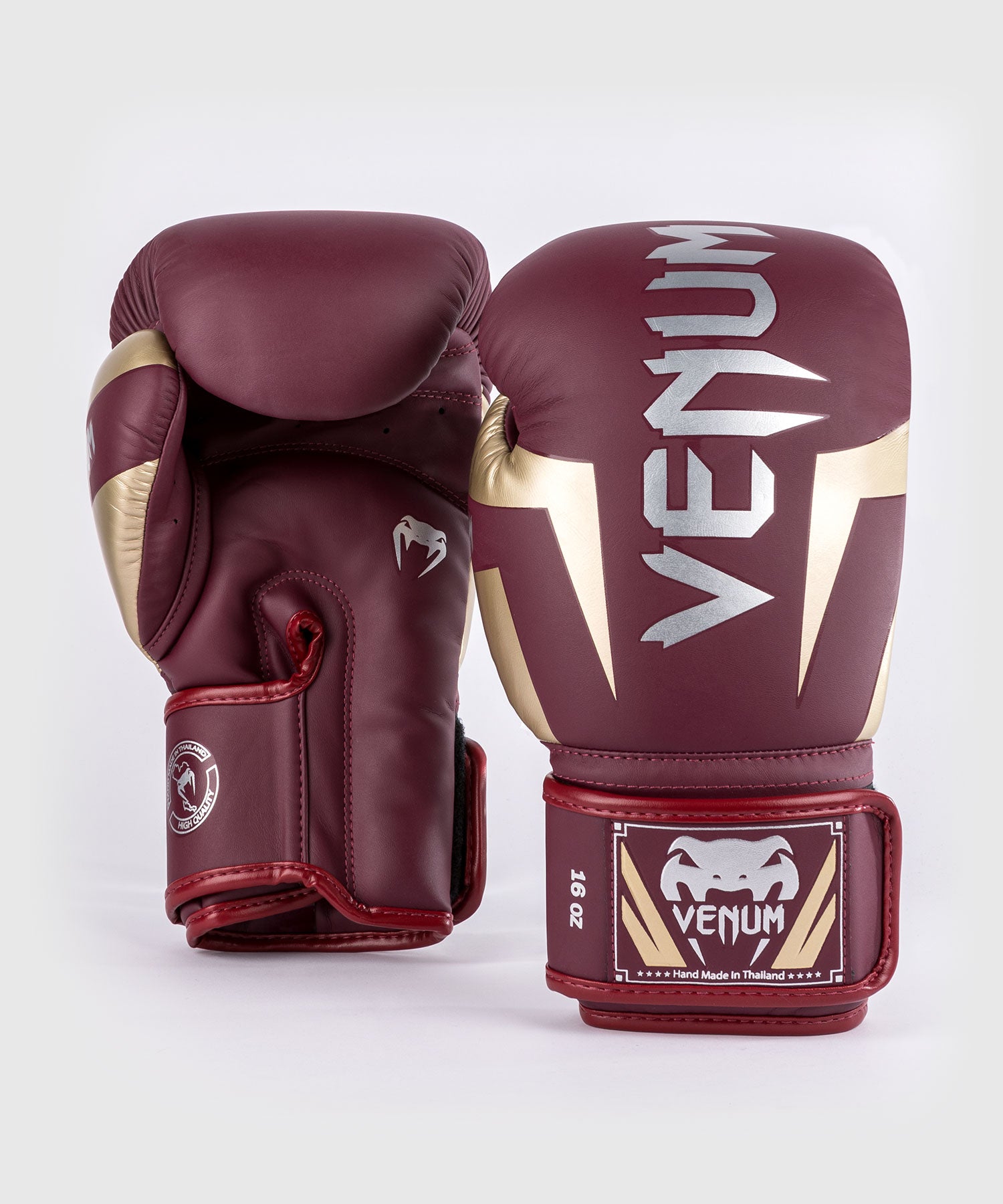 Venum Elite boxing gloves Burgundy Gold front view showing glove shape