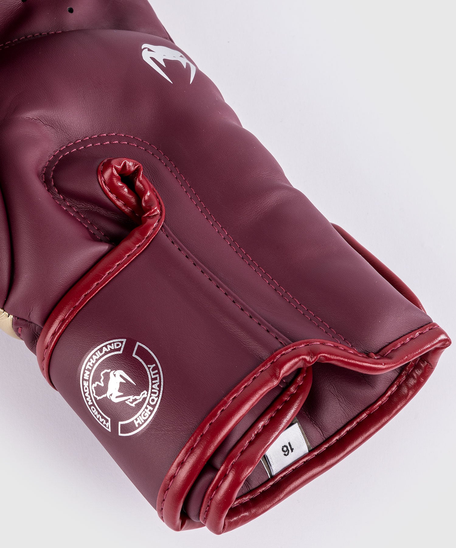 Palm view of Venum Elite boxing gloves showing reinforced palm and mesh panel