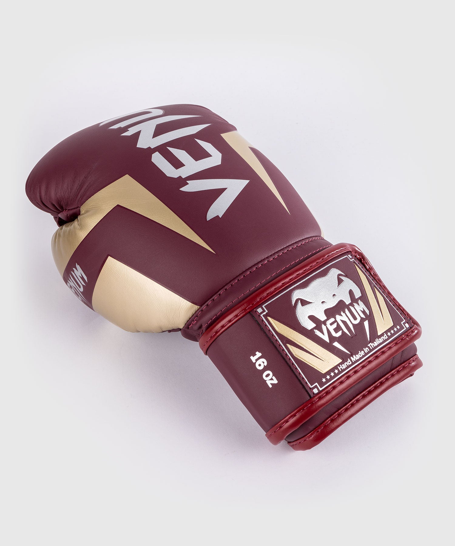 Venum Elite boxing gloves Burgundy Gold side profile showing long cuff support