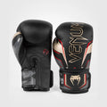 Venum Elite Evo boxing gloves for Muay Thai, kickboxing, and professional training.
