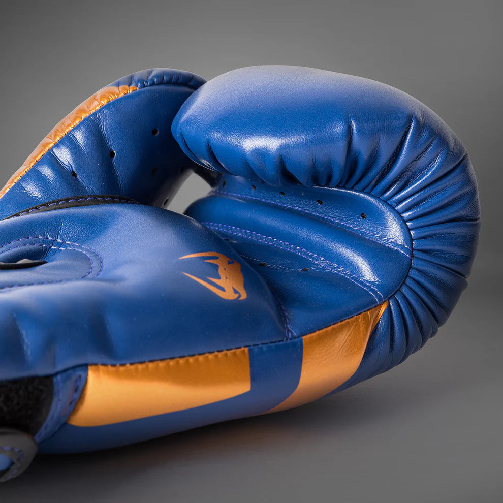 Venum Elite boxing gloves with breathable mesh panels and strong wrist strap for secure fit.