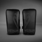 Venum Giant Kick Pads for Muay Thai, MMA, boxing, and kickboxing training with dense foam padding.