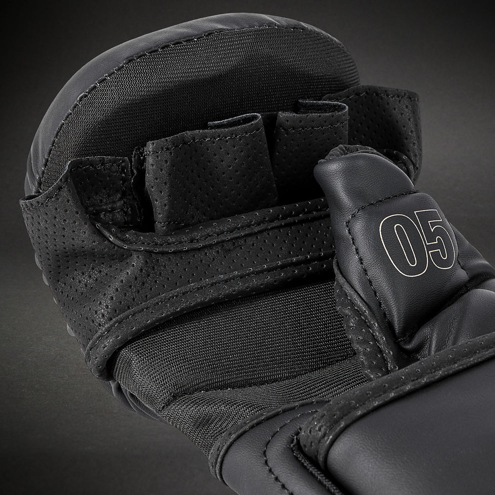 Micro-perforation ventilation detail close-up on Venum Impact Evo MMA Sparring Gloves Black