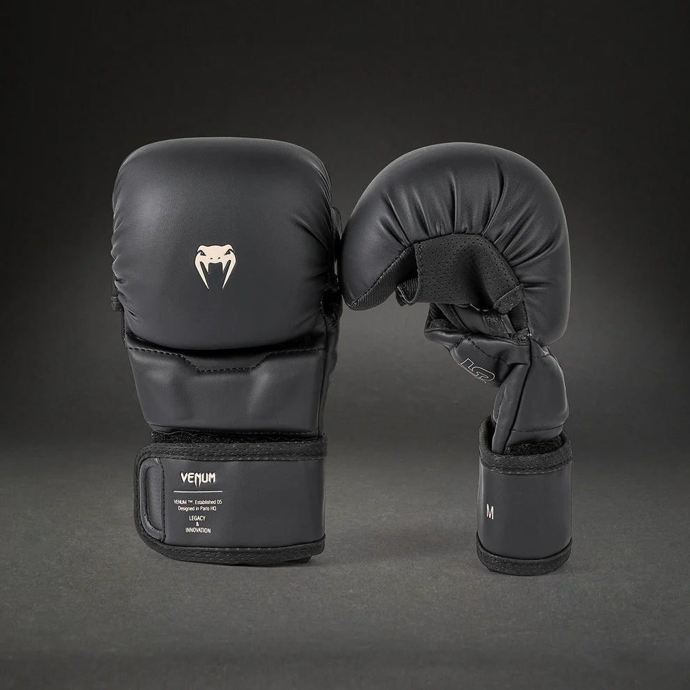 Side profile of Venum Impact Evo MMA Sparring Gloves Black showing MMA sparring glove shape