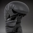 Skintex leather surface and beige stitching detail on Venum Impact Evo MMA Sparring Gloves Black