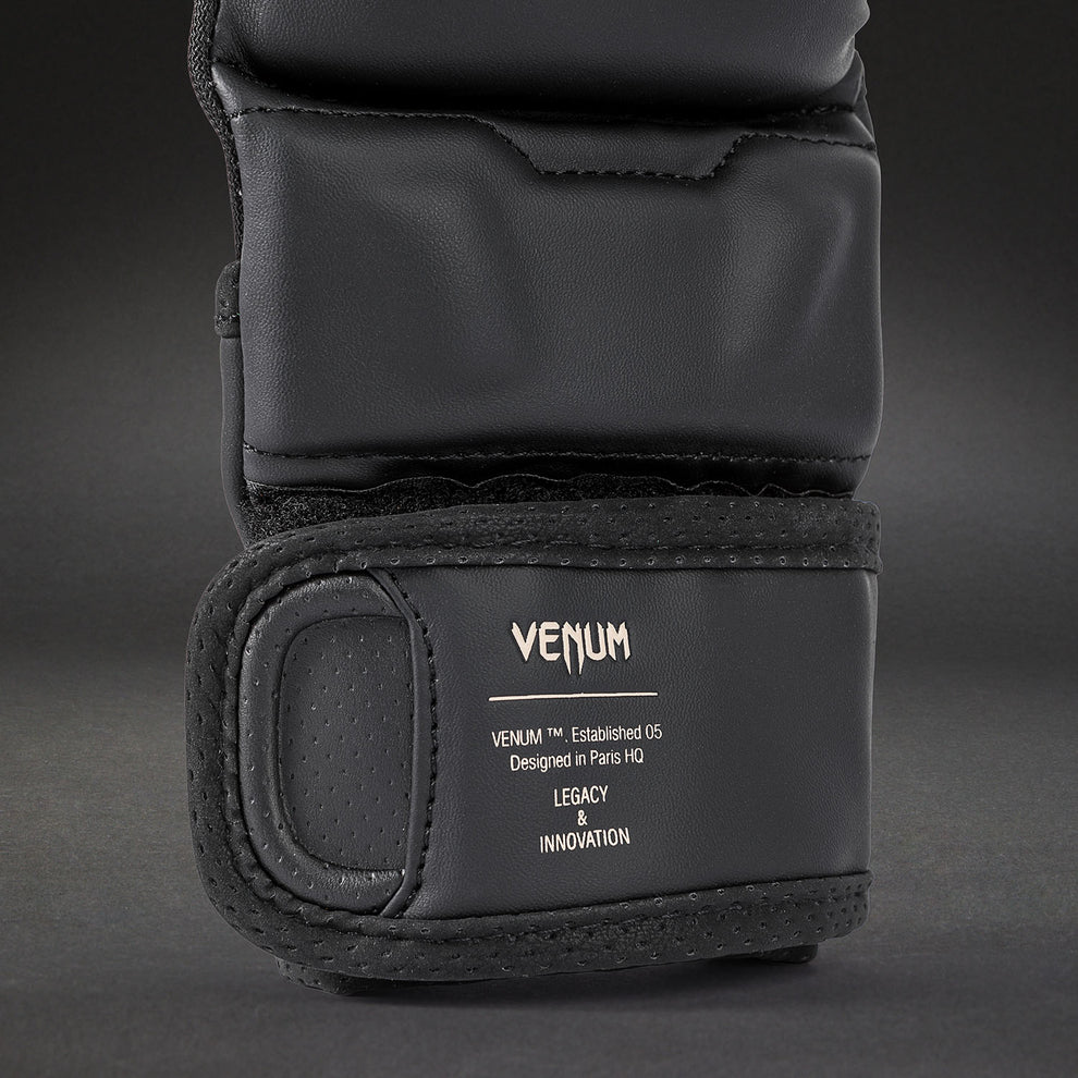 Wide hook and loop wrist closure close-up on Venum Impact Evo MMA Sparring Gloves Black