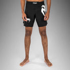 Venum Light 5.0 Fightshort Black White front view showing lightweight MMA fight shorts