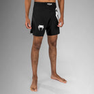 Venum Light 5.0 Fightshort Black White Side view showing lightweight MMA fight shorts