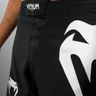 Hook-and-loop waist closure close-up on Venum Light 5.0 Fightshort Black White