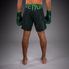 Back view of Venum Light 5.0 Fightshort Forest Green Light Green with Venum logo on the waist