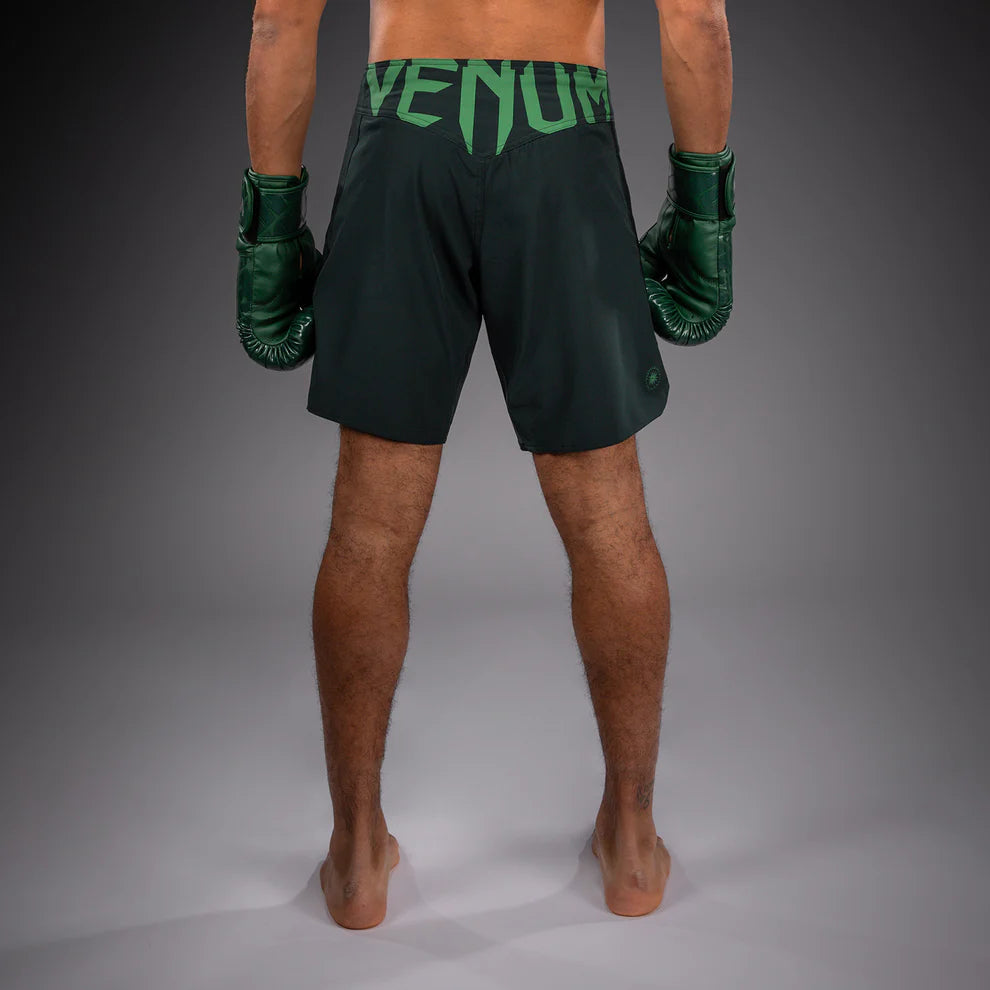 Back view of Venum Light 5.0 Fightshort Forest Green Light Green with Venum logo on the waist