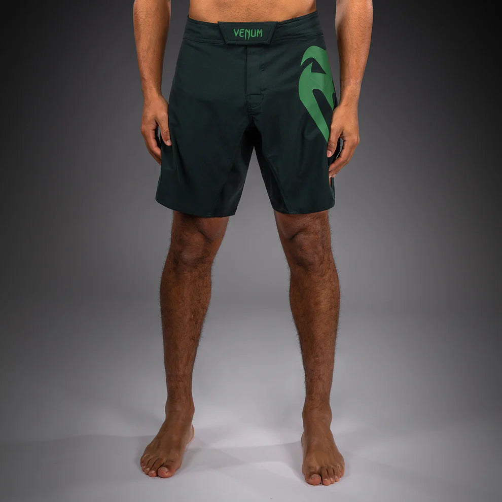 Venum Light 5.0 Fightshort Forest Green Light Green front view showing lightweight MMA fight shorts