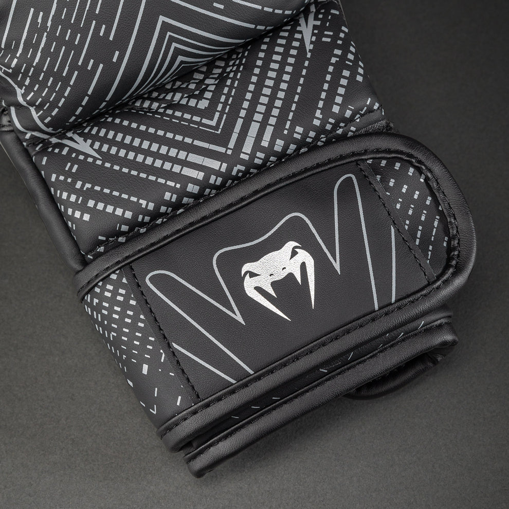 Venum logo detail close-up on Midnight Fury Sparring Gloves Black Grey Silver