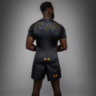 Back view of Venum Serpenti Short Sleeve Rashguard Black Silver Gold for BJJ and grappling training