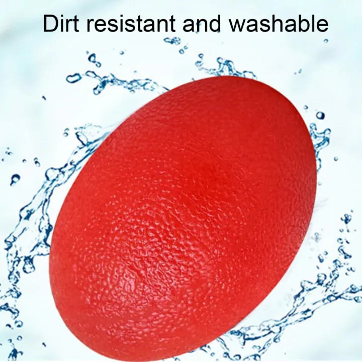 Silicone hand grip ball being rinsed under water for cleaning