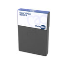 Yogi using grey Yoga-Mad Full Yoga Block to assist in a balance pose during yoga practice.