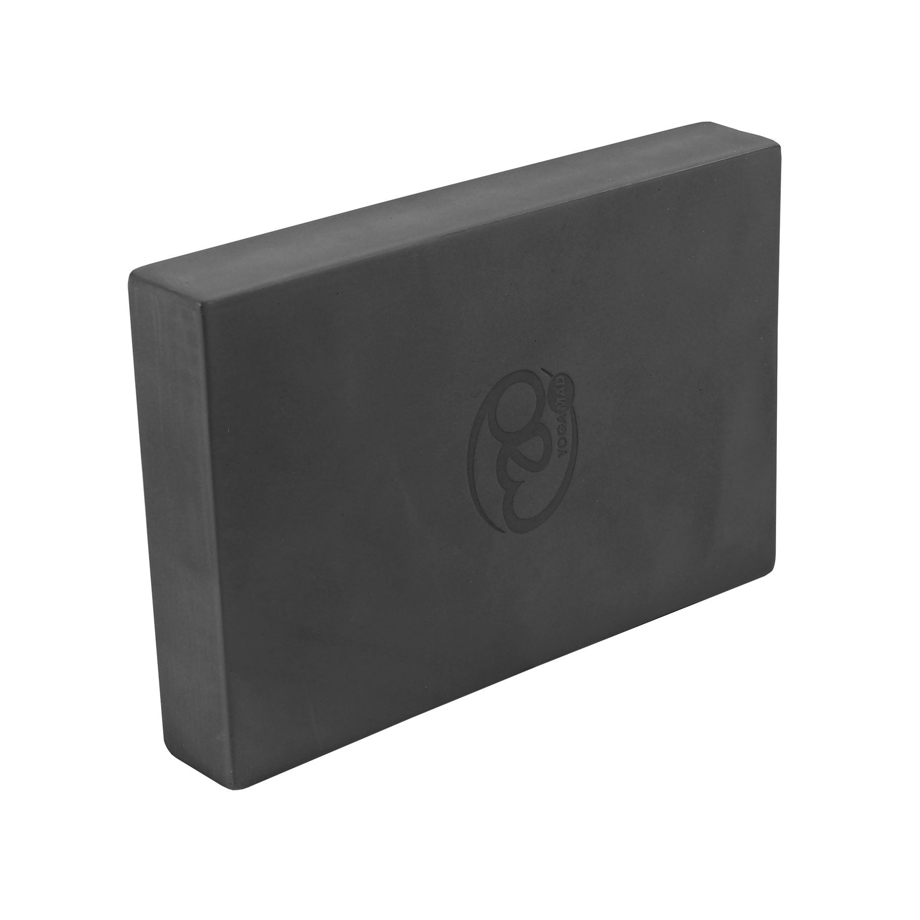 Side profile of grey Yoga-Mad Full Yoga Block highlighting dense EVA foam structure.