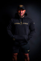 Model wearing the Zander Training Hoodie during a boxing warm-up session