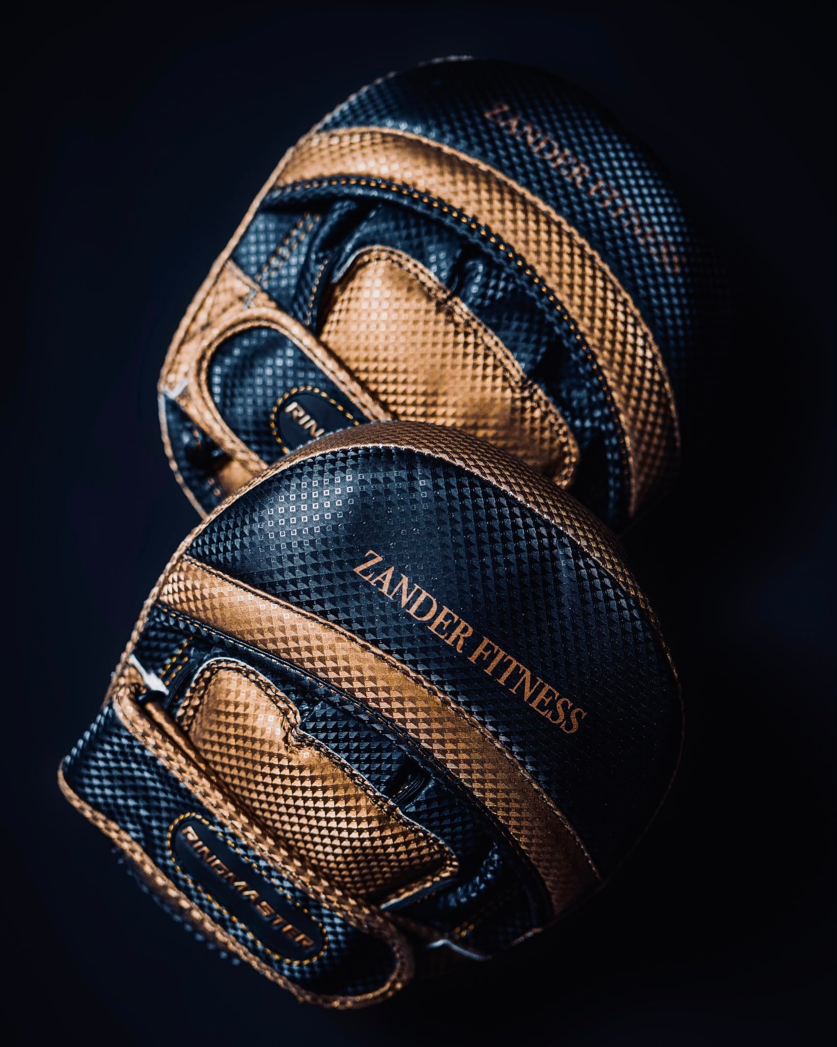 Zander x RingMaster Focus Pads Black Gold used for boxing Muay Thai kickboxing and striking pad work