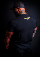 Model wearing the Zander Tee showing its modern athletic cut and flexible training fit