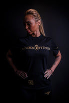 Model wearing the Zander Fitness Tee during fitness and strength training